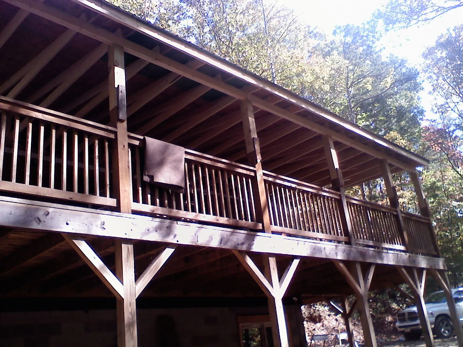 Timber framing under a new elevated porch and deck — Roof Leak Repair in Deming by Roofing Brothers
